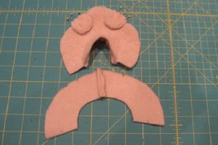 Sew the ear pieces