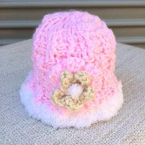 baby hat pink colour and white edge